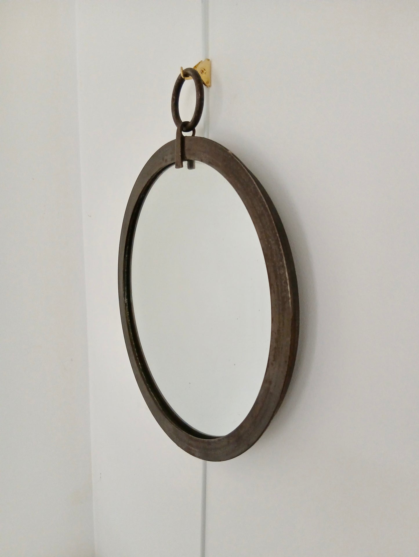 Miroir en fer patiné années 50