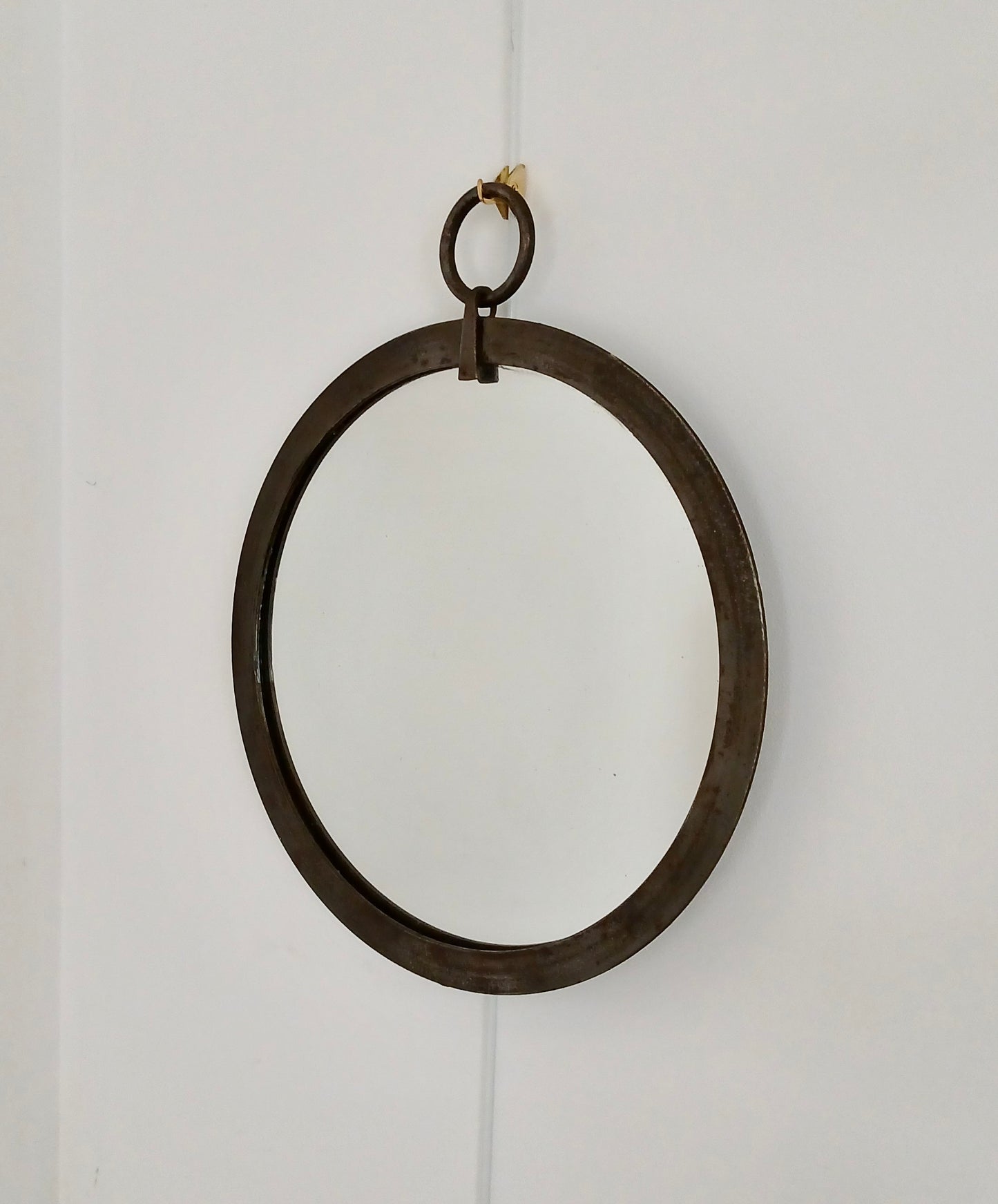 Miroir en fer patiné années 50